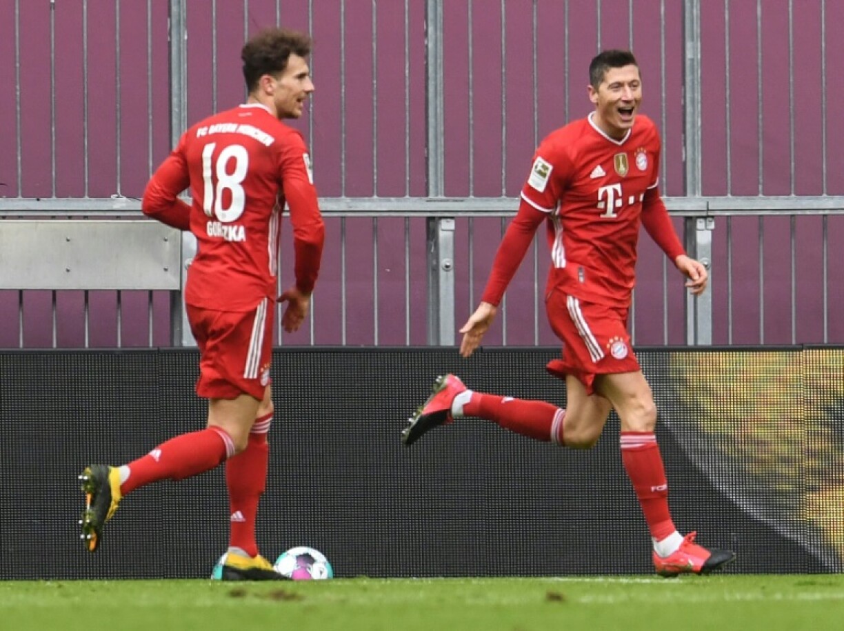 La joie de l'attaquant du Bayern Munich, le Polonais Robert Lewandowski, après un but marqué contre Stuttgart, lors de leur match de Bundesliga, le 20 mars 2021 à Munich