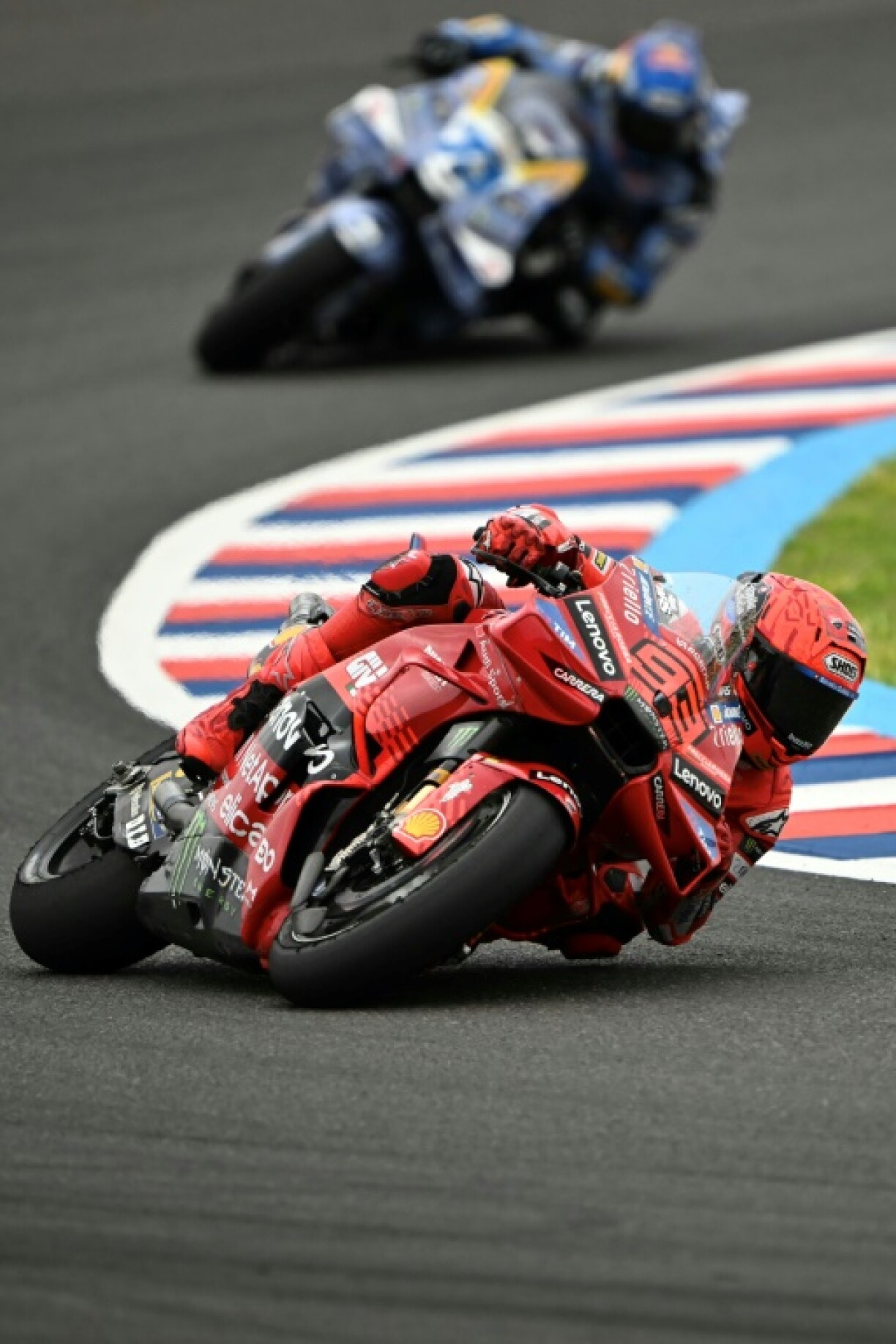 Marc Marquez lost the world championship lead to his younger brother Alex Marquez (back) at the USA MotoGP