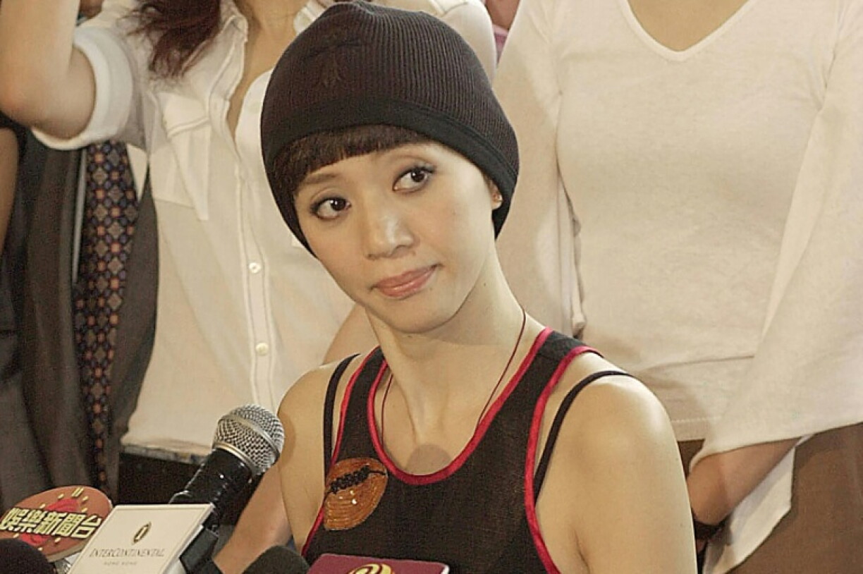 (FILES) Hong Kong canto-pop star Anita Mui takes part in a press conference at a hotel in Hong Kong on September 5, 2003.