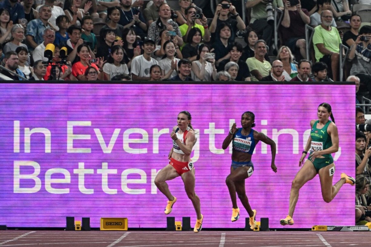 Melissa Jefferson-Wooden (C) is seeking to become the first woman to achieve a sprint world double since Shelly-Ann Fraser-Pryce