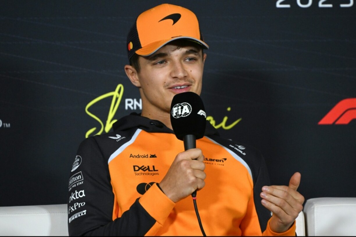 McLaren's Lando Norris talks to reporters ahead of the Chinese Grand Prix at the Shanghai International Circuit