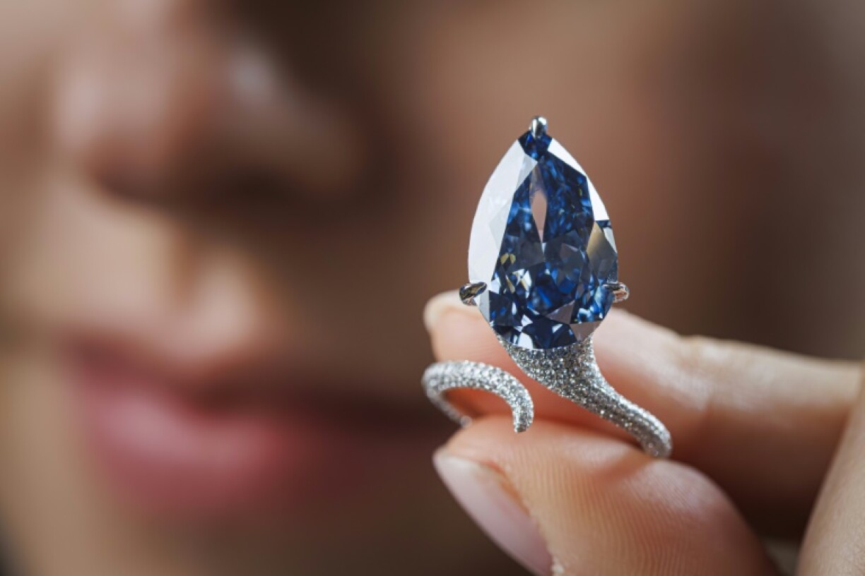 The diamond is a 9.51-carat fancy vivid blue
