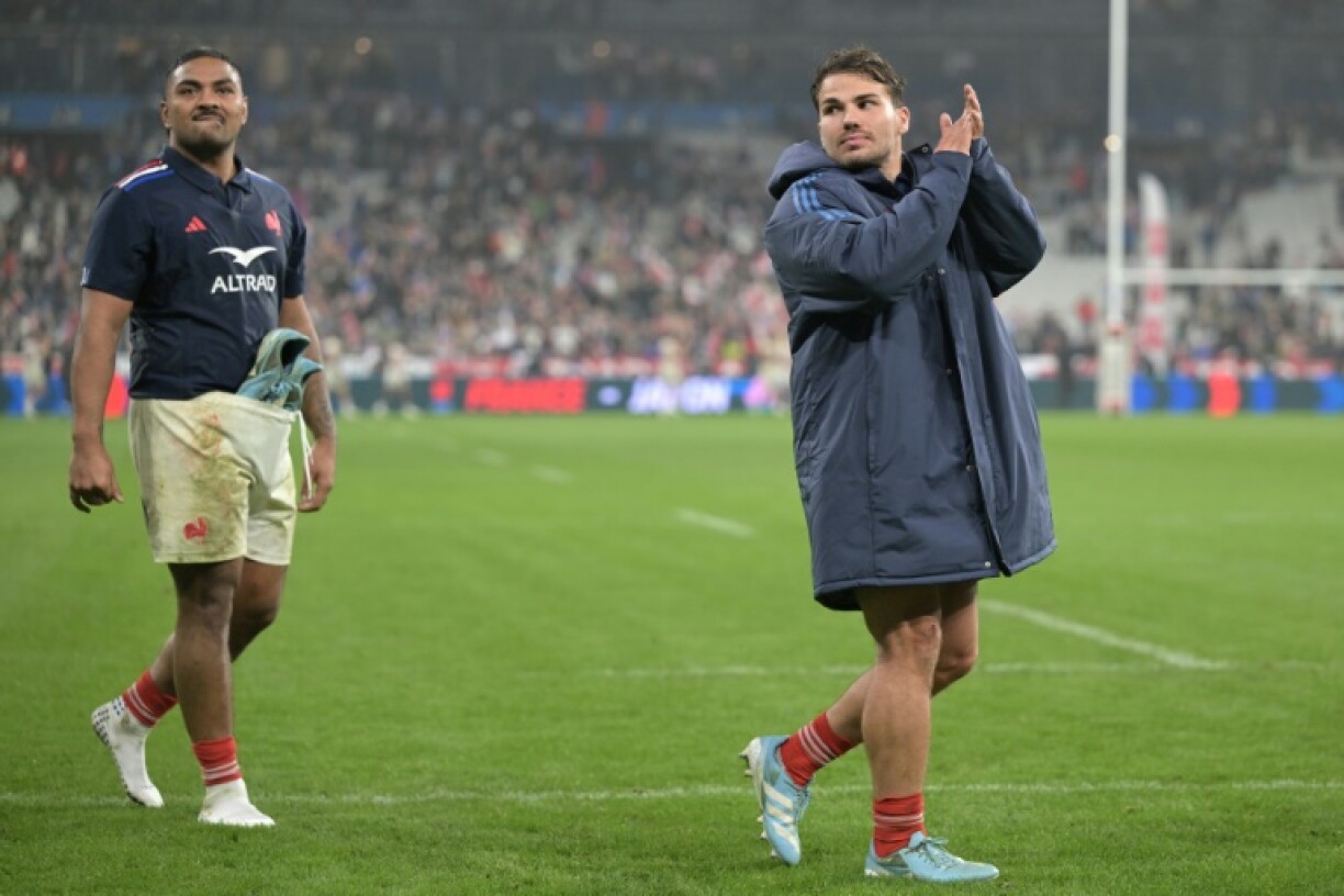 Peato Mauvaka (L) and Antoine Dupont (R) celebrate France's win over Japan in November