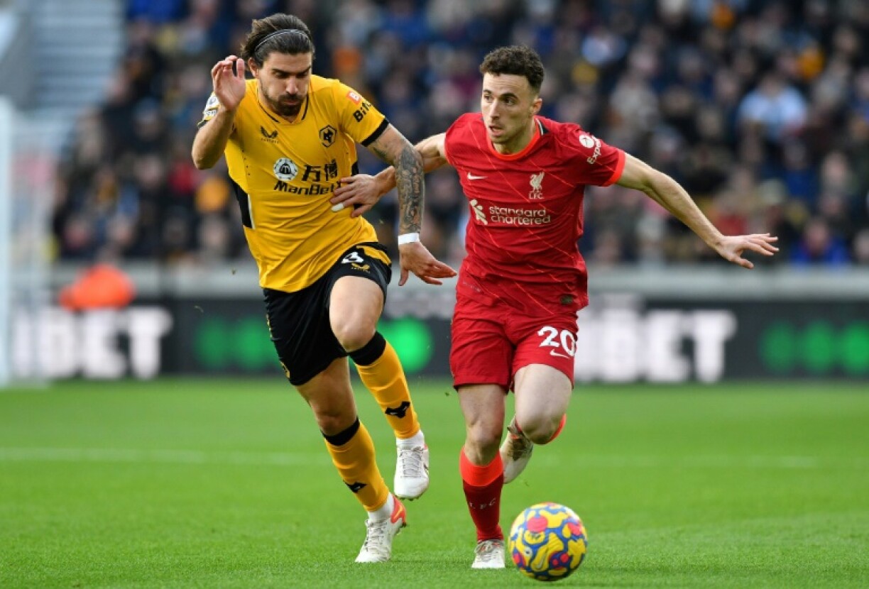 Ruben Neves (L) said he will never forget his former Wolves team-mate Diogo Jota (R) killed in a car crash aged 28