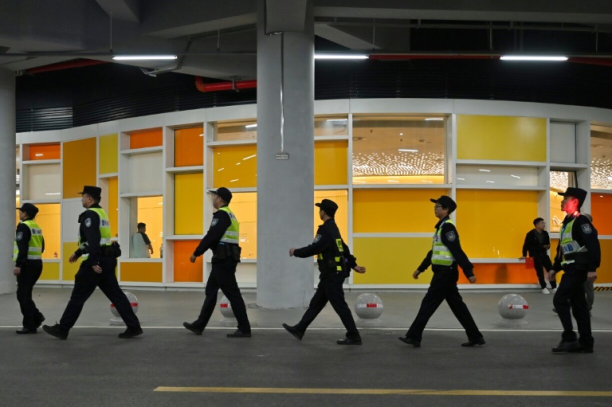 Police ahead of the World Cup qualification football match between China and Japan in Xiamen in November