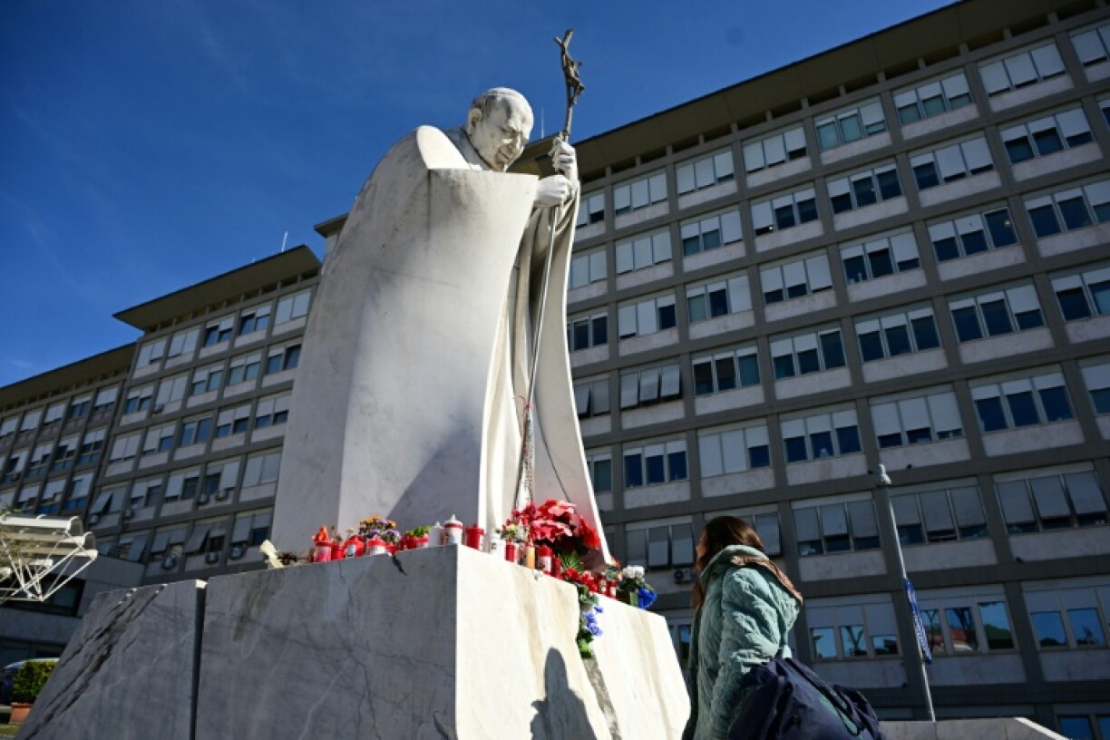 A statue of Pope John Paul II outside the Gemelli hospital in Rome where 88-year-old Pope Francis is being treated for bronchitis