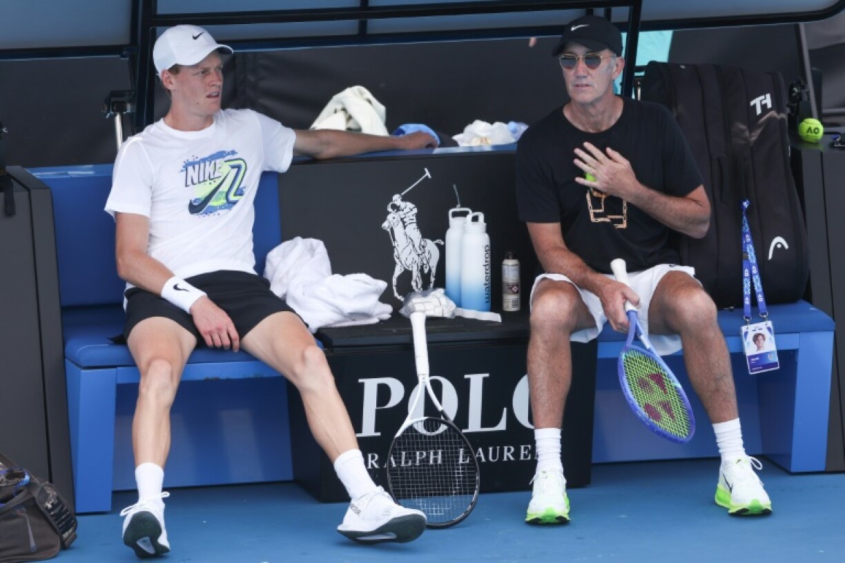 Italy's Jannik Sinner (L) and coach Darren Cahill at the Australian Open