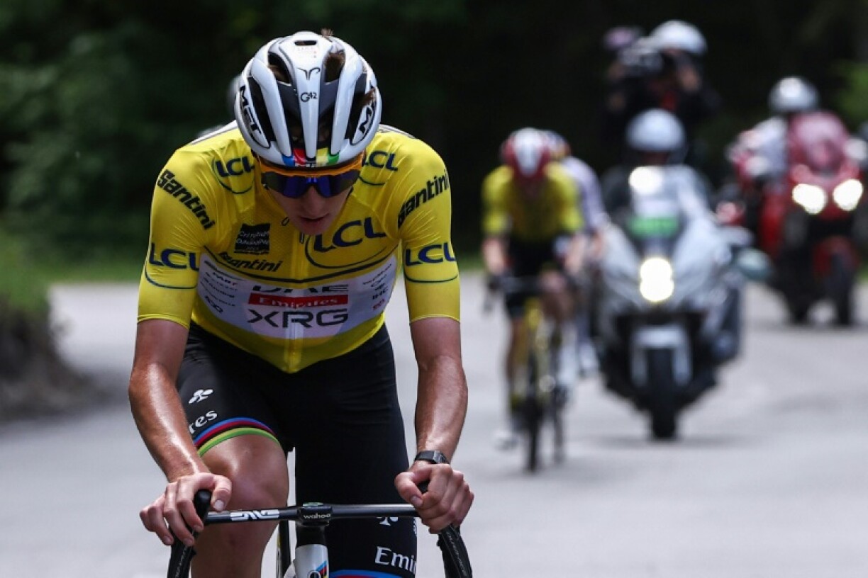 Tadej Pogacar being shadowed by Jonas Vingegaard