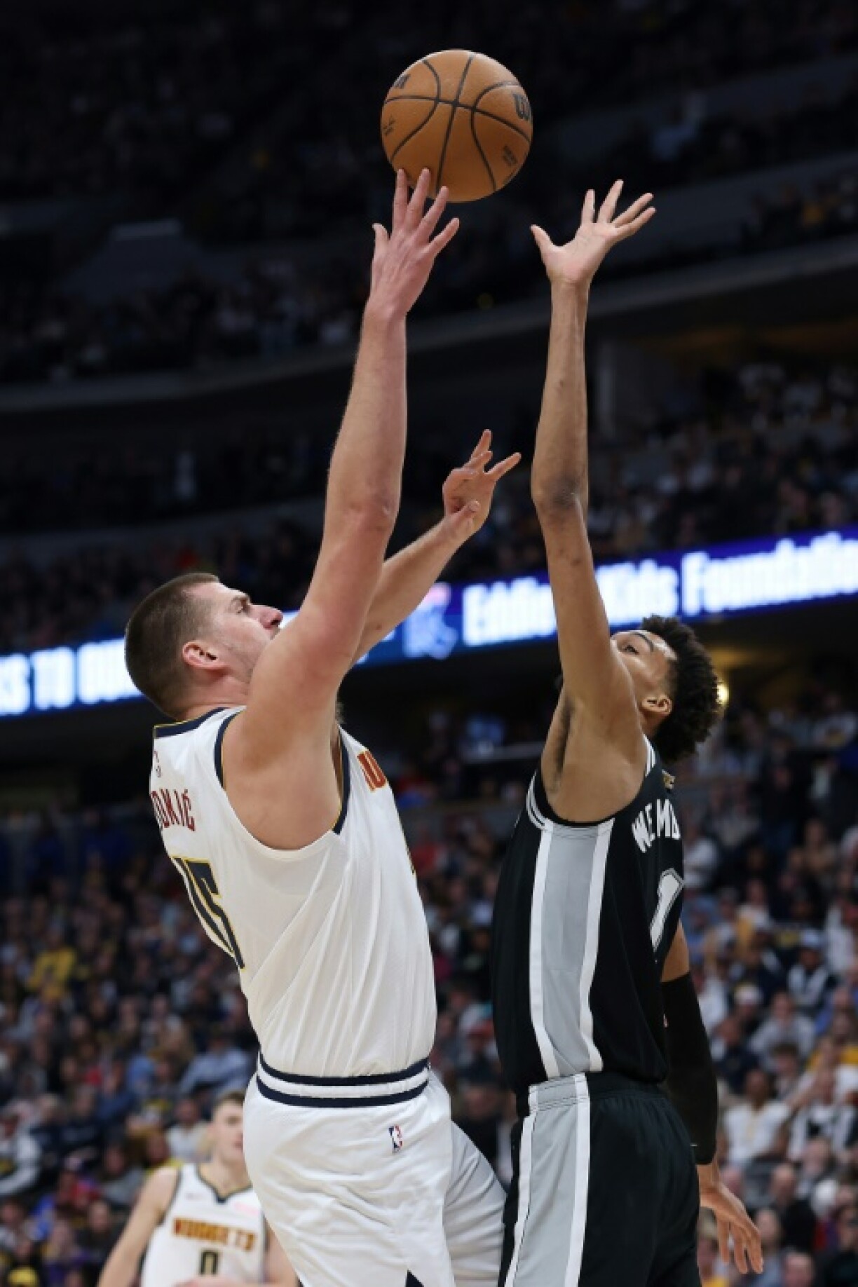 Denver's Nikola Jokic takes a shot over San Antonio's Victor Wembanyama, who was a winner in his 100th career NBA game