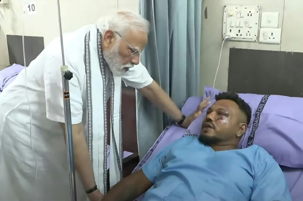 India's Prime Minister Narendra Modi met Vishwash Kumar Ramesh, the sole survivor of the Air India flight 171 crash