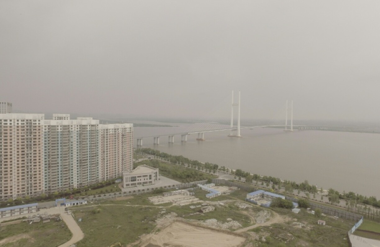 This file picture shows a new bridge linking China and North Korea that will finally open 12 years after its construction, with Beijing vowing it will spur trade and "enhance the well-being of the two peoples"