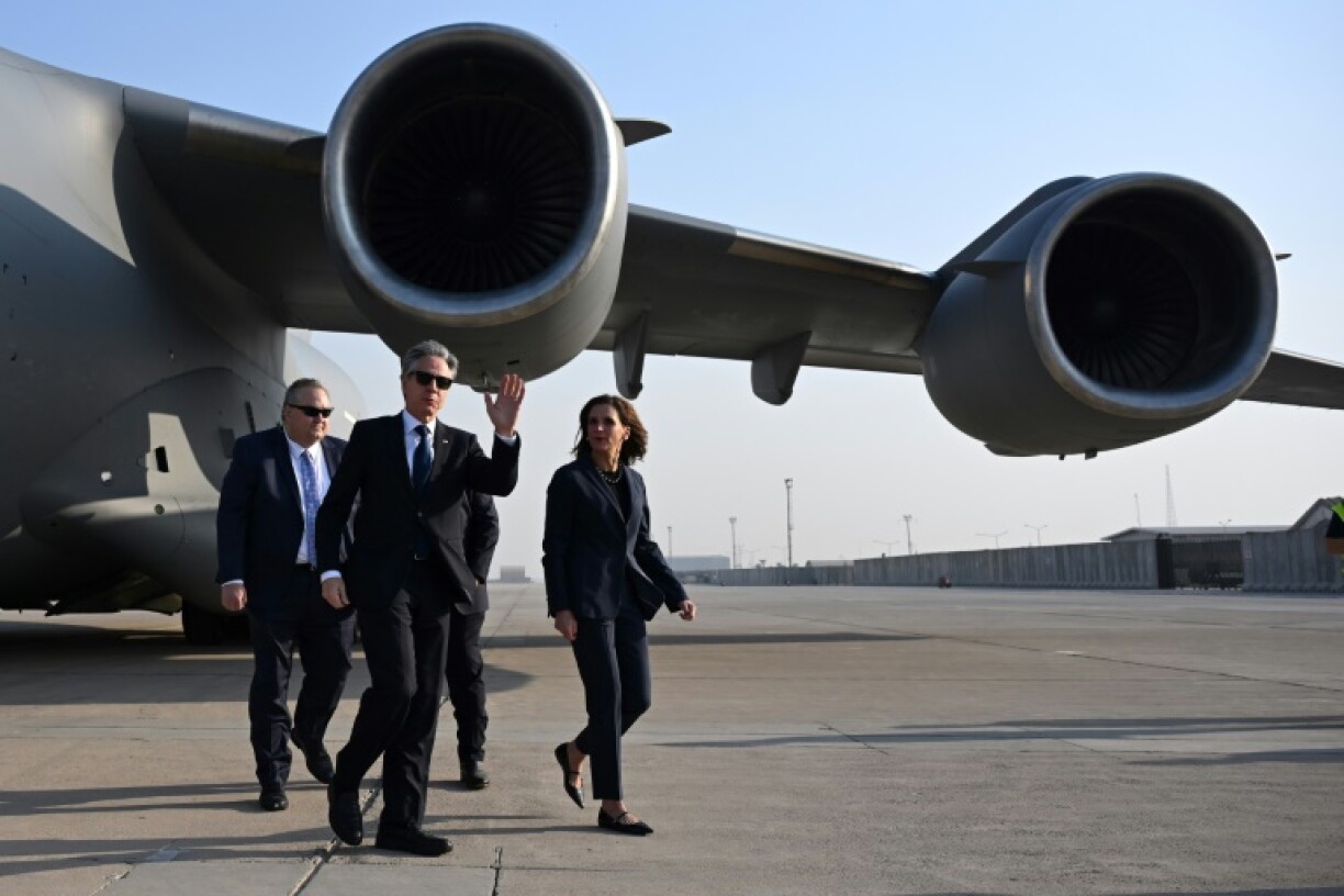 US Secretary of State Antony Blinken is welcomed by US officials upon landing in Baghdad, during his regional tour focused on Syria