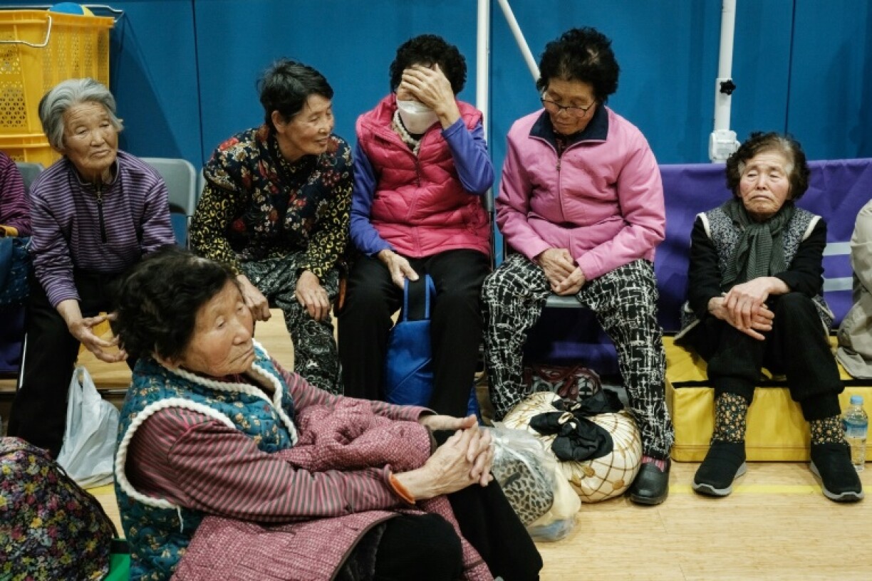 People evacuated from their homes due to the approaching wildfire, stay at the gymnasium of Sinsung Elementary School in Andong