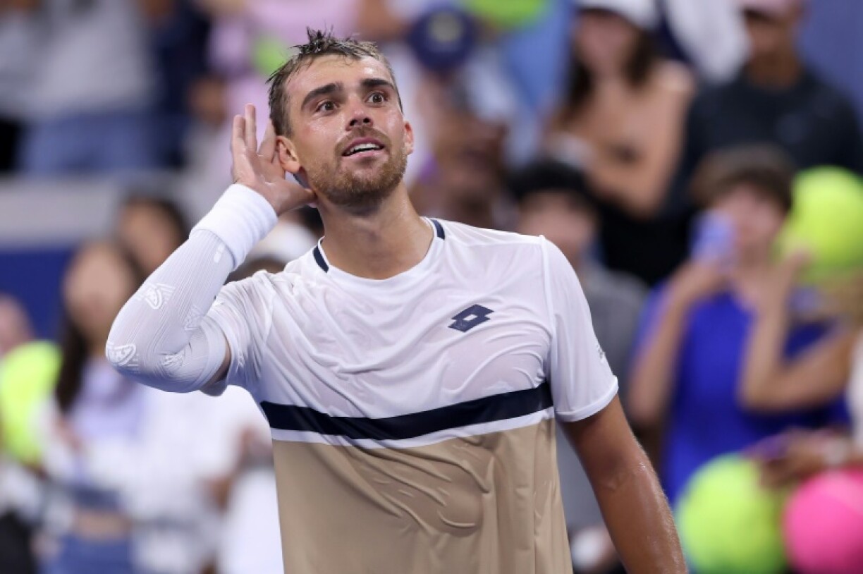 France's Benjamin Bonzi gestures to the crowd after his stormy win over Daniil Medvedev