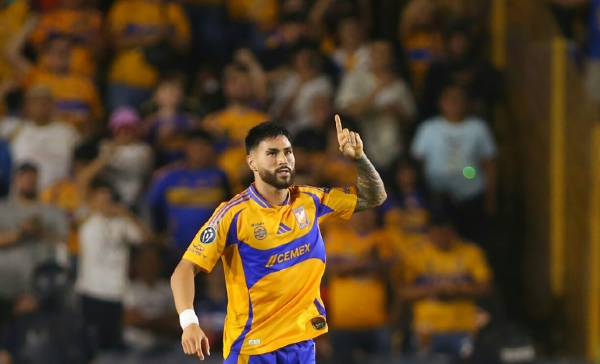 Tigres' defender Juan Jose Purata celebrates after scoring the equalizer against Tigres UANL in the CONCACAF Champions Cup semi-final first leg on Wednesday.