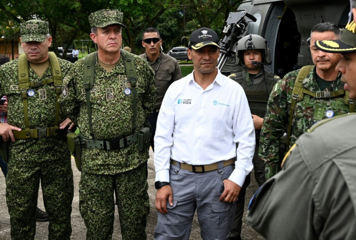 Colombian Defense Minister Pedro Sanchez tours a coca eradication program on Colombia's restive border with Ecuador