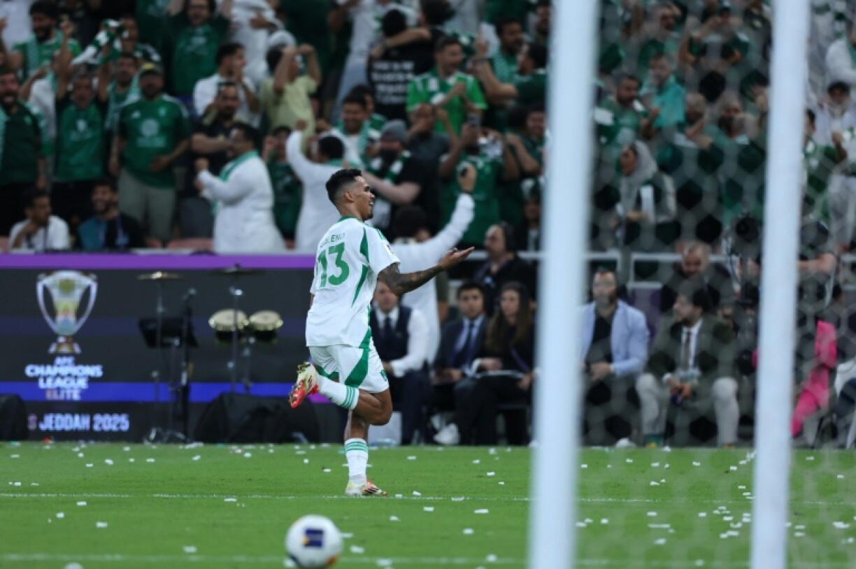 Al Ahli's Brazilian forward Galeno celebrates scoring his team's first goal during the AFC Champions League final