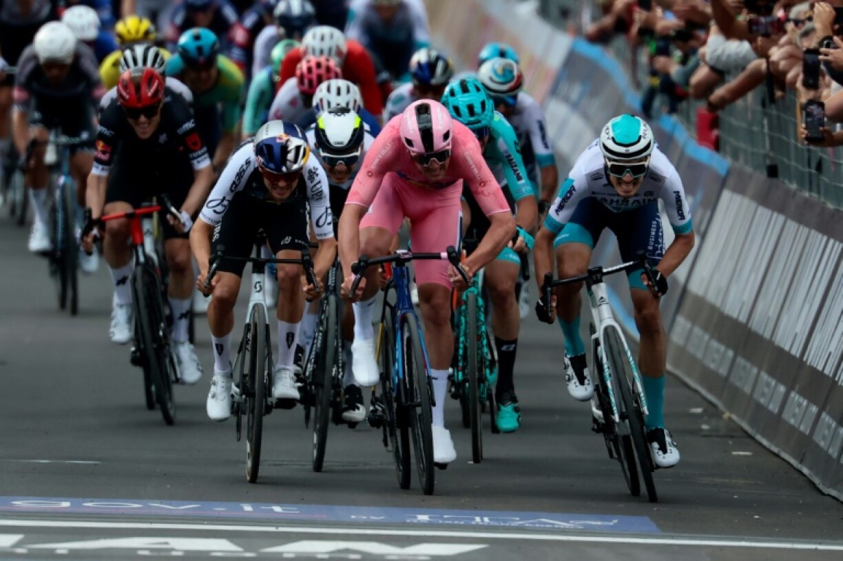 Mads Pedersen, in pink, sprints towards victory in stage five of the Giro d'Italia