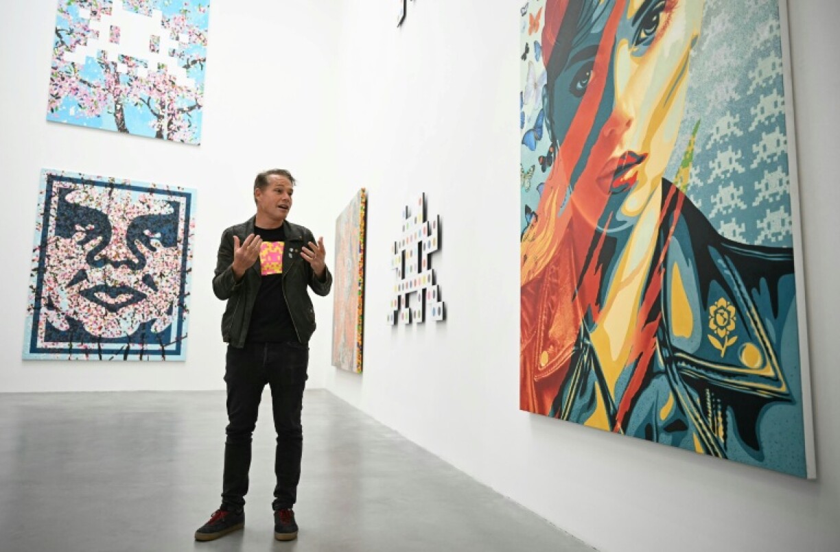 US artist Shepard Fairey has joined forces with Briton Damien Hirst and French street artist Invader for a unique 'joyful and playful' collaboration in London