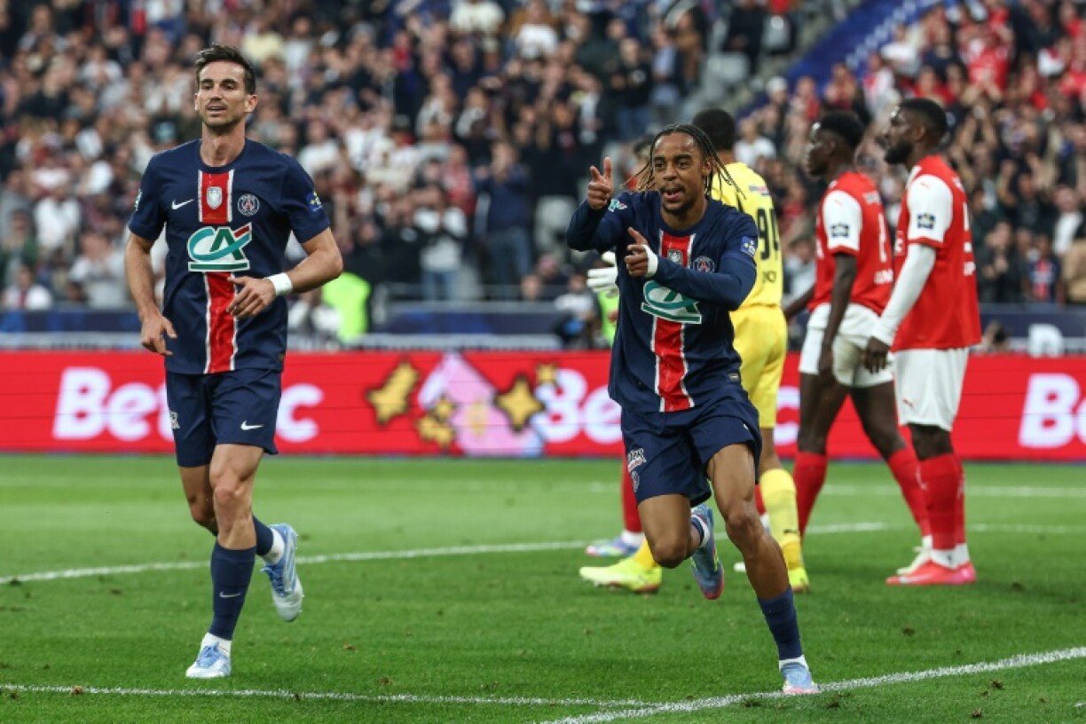 Bradley Barcola (R) celebrates after scoring his and Paris Saint-Germain's second goal in their French Cup final win over Reims on Saturday