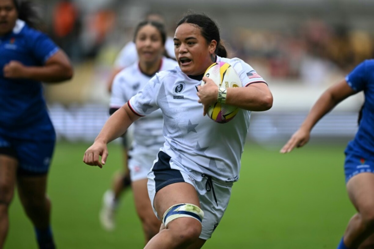 United States flanker Freda Tafuna scores one of her four tries in a 60-0 Women's Rugby World Cup Pool A win over Samoa in York