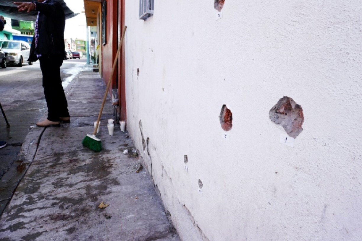 Bullet holes are seen in a wall after a shooting in Irapuato in central Mexico