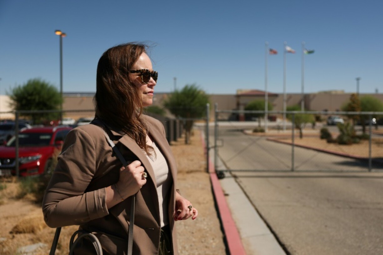 Attorney Kristen Hunsberger of the Immigrant Defenders Law Center spends hours on the road going from one center to another to locate her clients