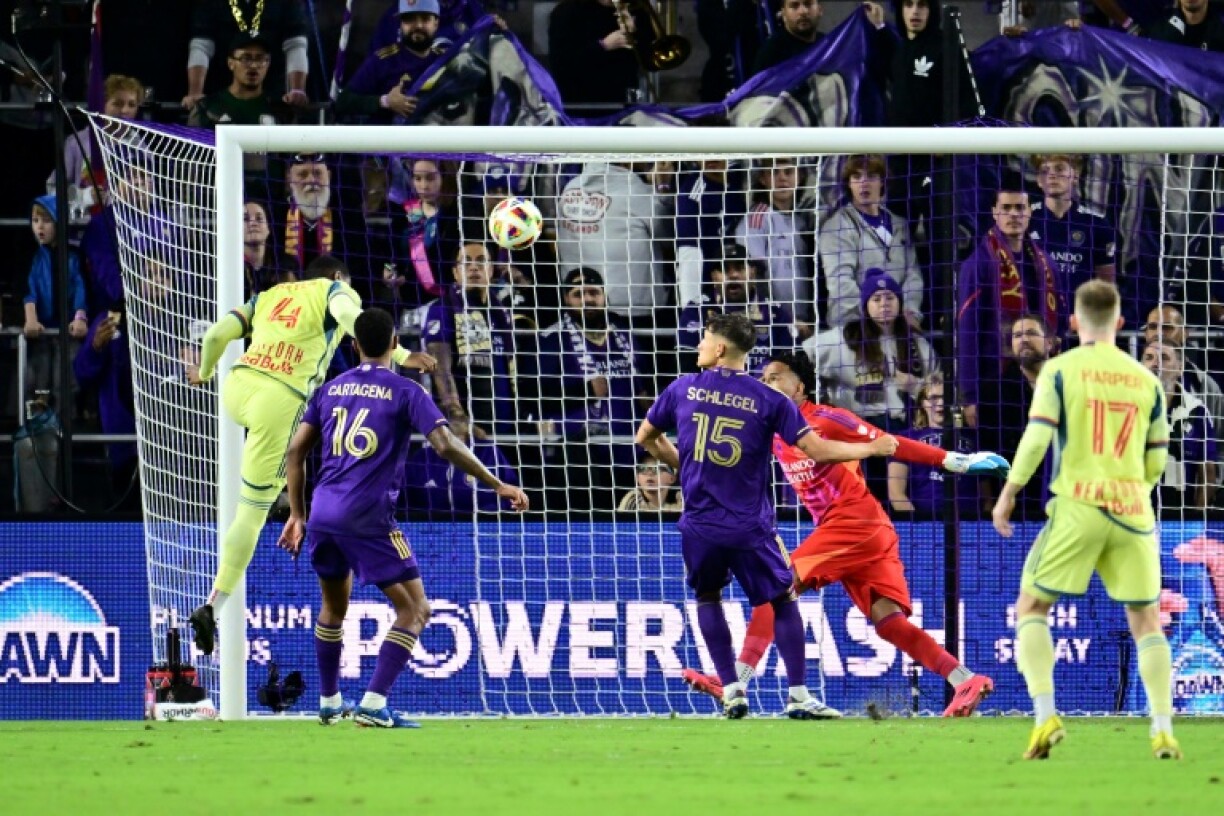 Andres Reyes heads in the winner as the New York Red Bulls beat Orlando City to reach the MLS Cup final.