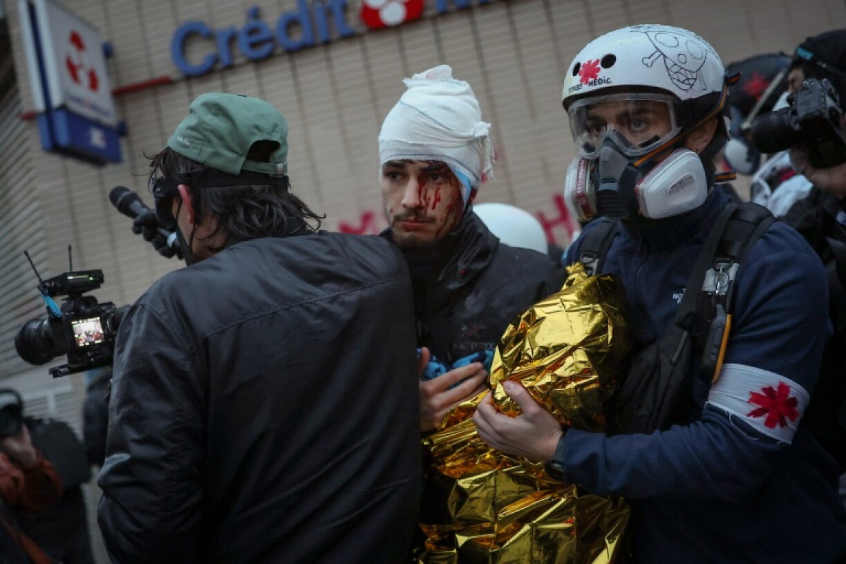 Street medics in the demonstrations tended to several hurt protesters, as seen here during a rally in Paris on Saturday