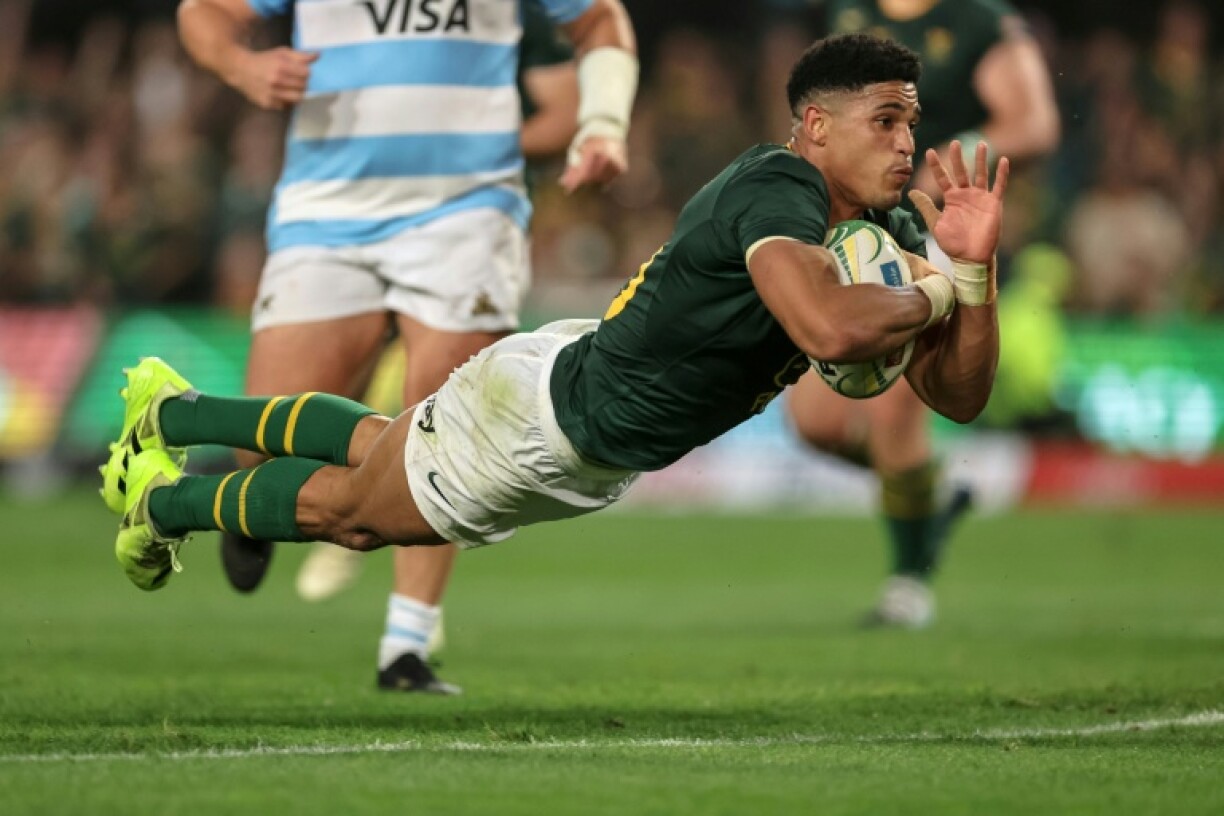 Sacha Feinberg-Mngomezulu scores one of his three tries for South Africa against Argentina in Durban.