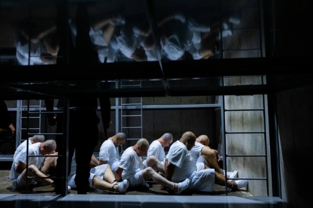 People deported from the United States are being held in El Salvador's maximum security CECOT prison