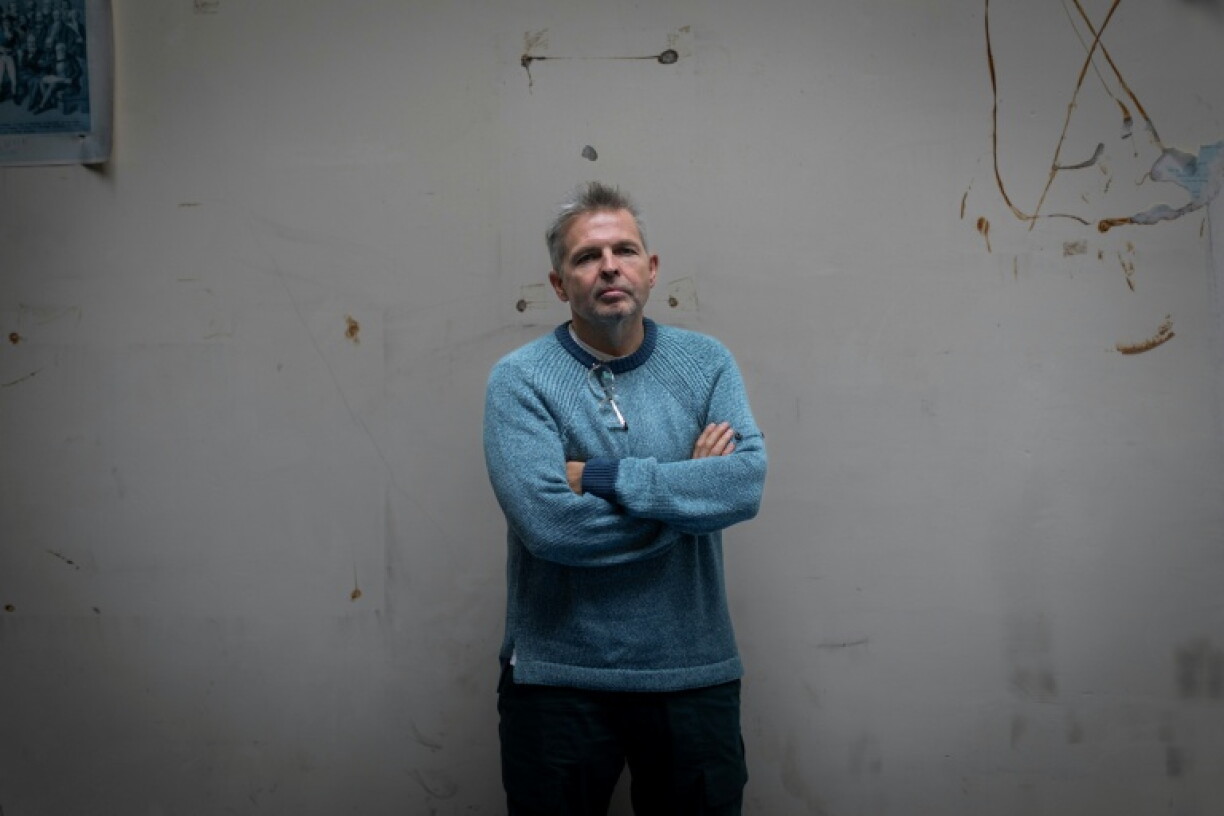 Badanin (pictured) and colleague Mikhail Rubin wrote a taboo-breaking book about Putin