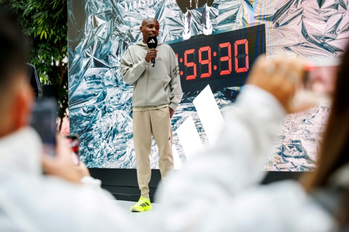 Kenya's Sabastian Sawe speaks at a sponsor event in Bavaria.