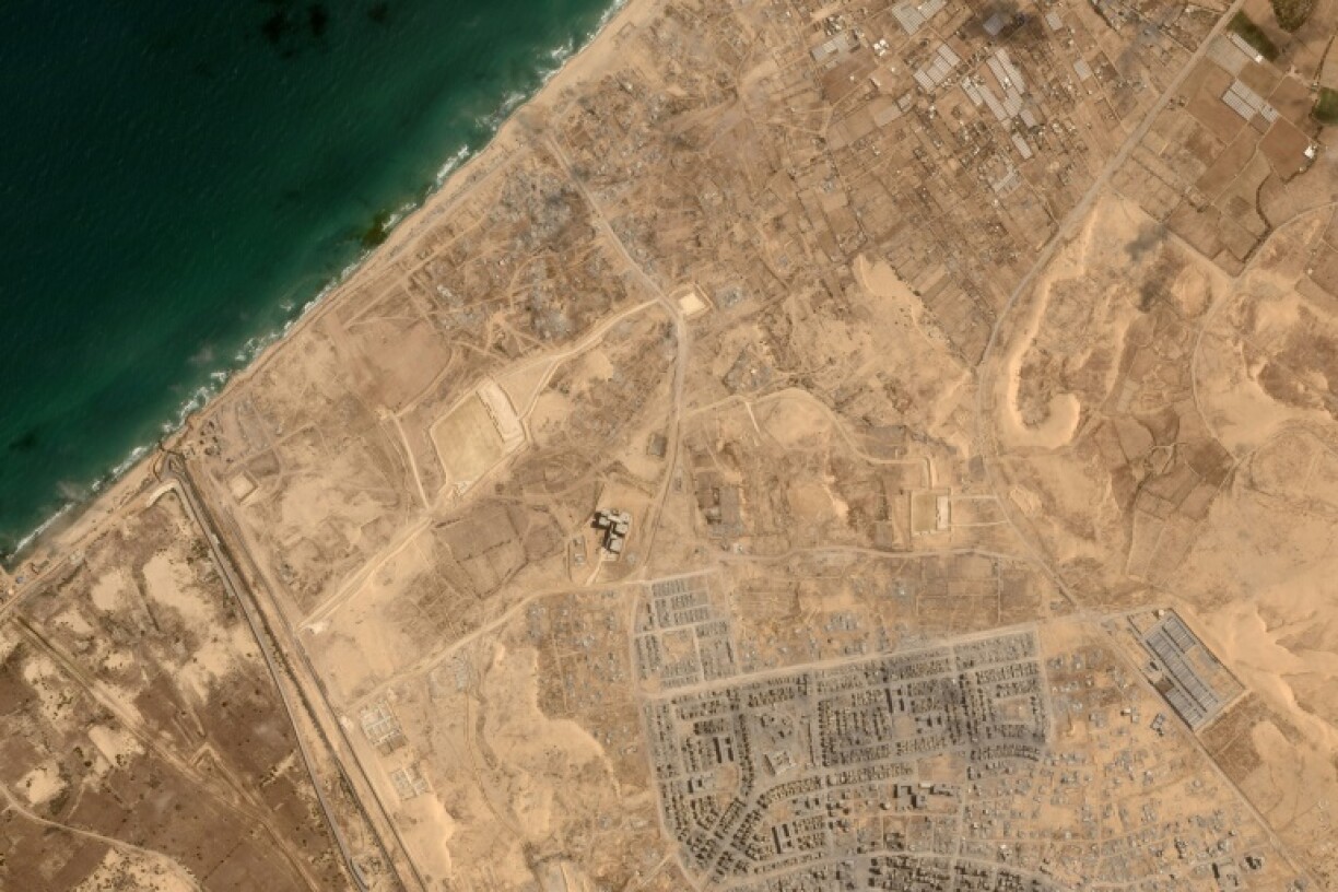 This handout satellite picture obtained from Planet Labs PBC dated on May 23, 2025, shows an area around Rafah in the southern Gaza Strip where a new aid distribution centre run by a US-backed group has been set up