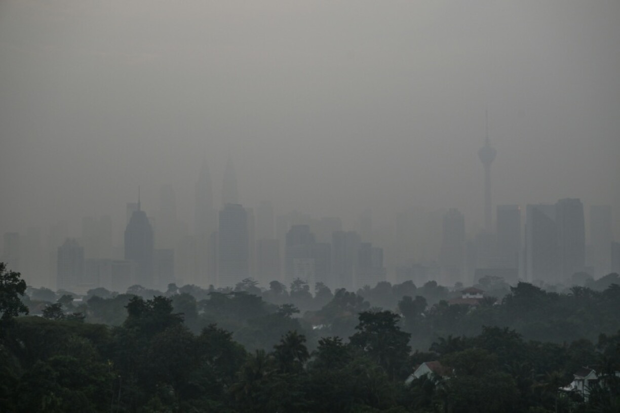 Fires in Indonesia have blanketed parts of Southeast Asia, including Malaysia's capital, with toxic haze and triggered the highest-level alert by the regional bloc's climate and fire monitor