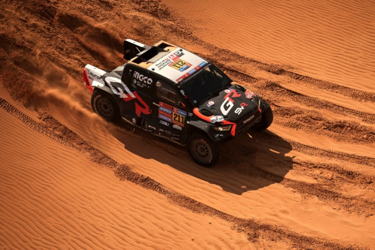 South African driver Henk Lategan and South African co-driver Breet Cummings compete during Stage 8 of the Dakar Rally