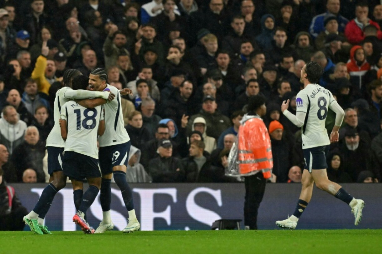 Tottenham celebrate scoring during their win over Chelsea
