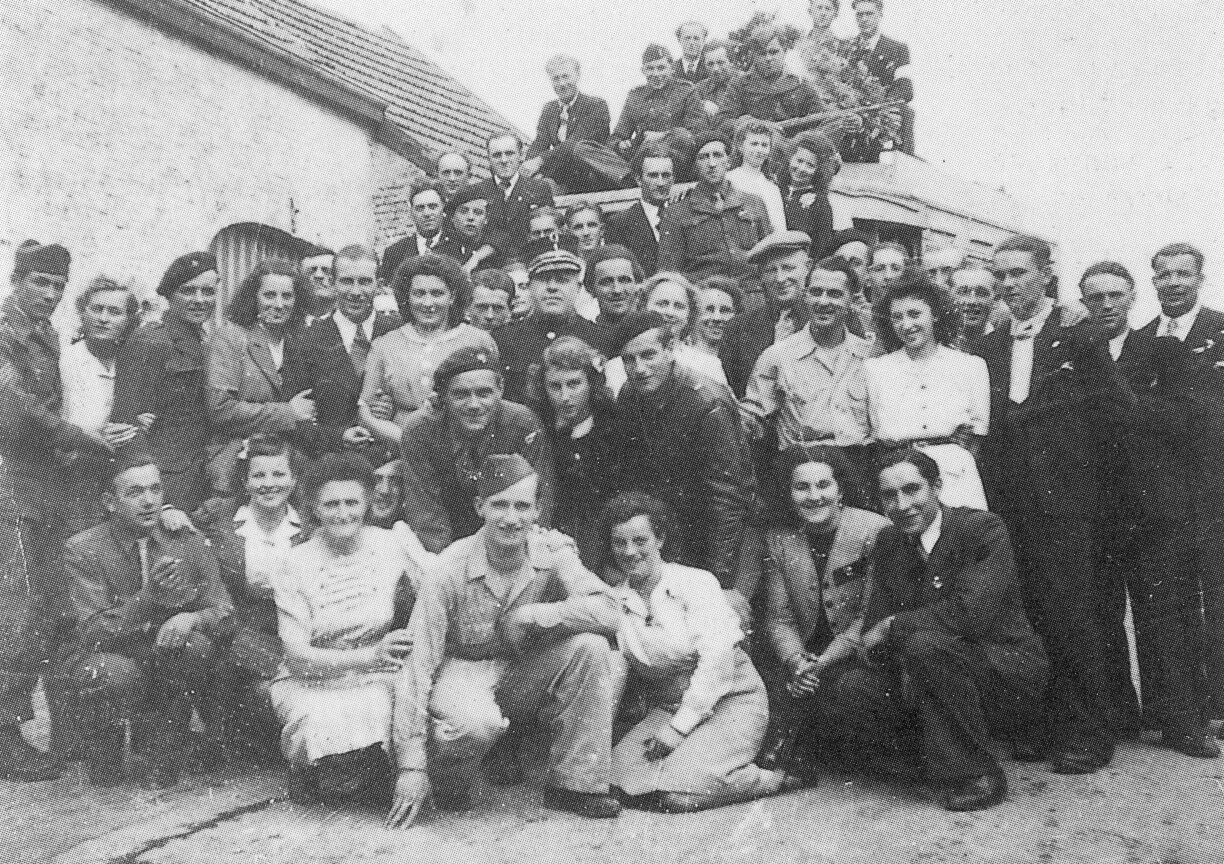 August 1945 Pierre and his freedom fighters from the Maquis (forest camp) return to Marloie to thank the Belgians for all their precious help during the war. Pierre second row third from left.