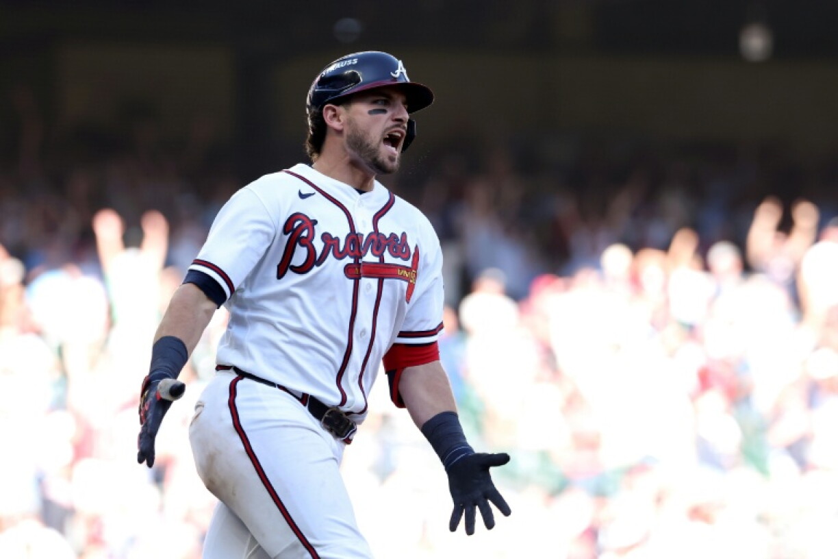 Atlanta's Austin Riley reacts after smashing a three-run home run to give the Braves a 5-3 victory over Philadelphia in the Major League Baseball playoffs