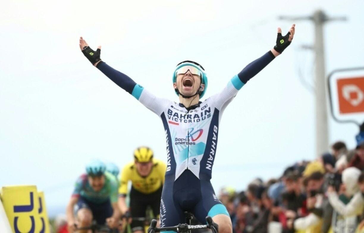 French rider Lenny Martinez celebrates winning the fifth stage of the Paris-Nice cycling race