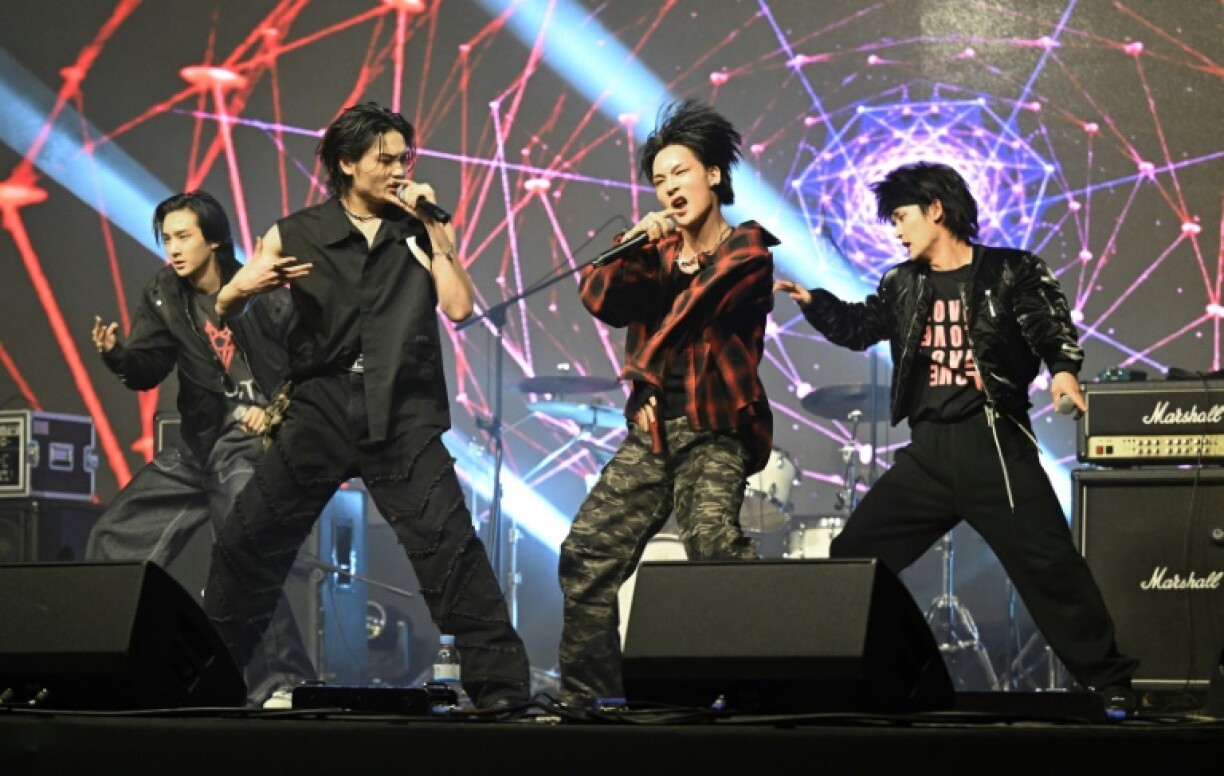 K-pop group 1Verse members (L-R) Kenny, Aito, Hyuk and Seok performing during a music festival in Suwon