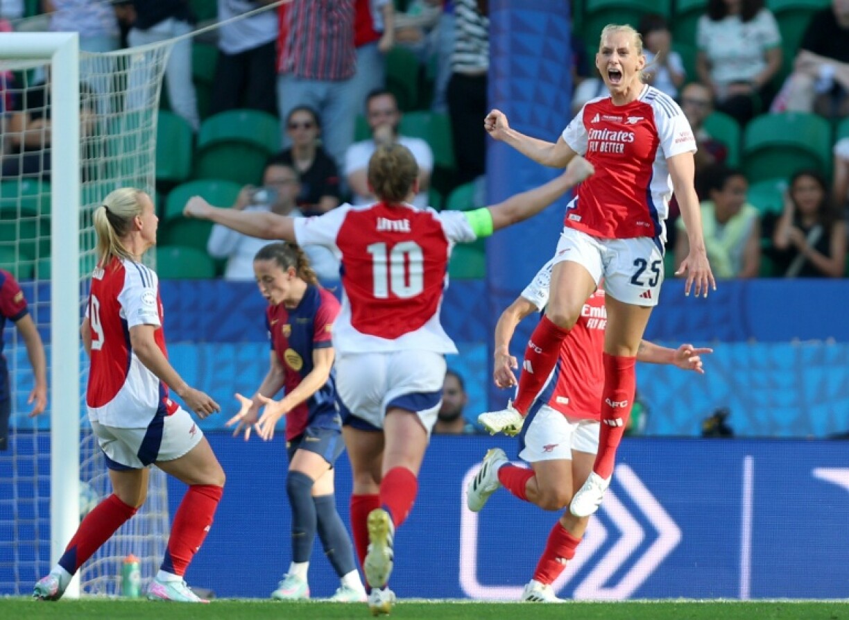 Arsenal's Swedish striker Stina Blackstenius celebrates with team-mates after netting in the women's Champions League final