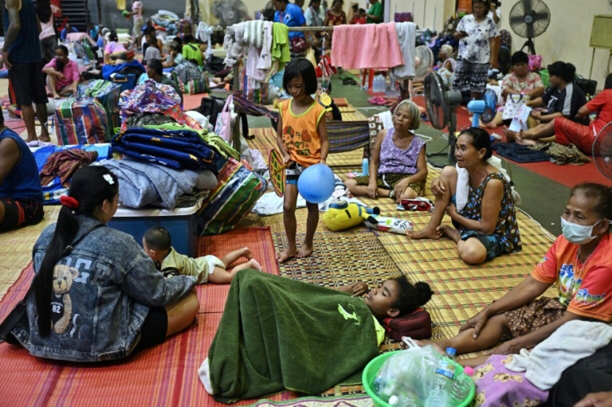 Evacuees rest at an evacuation centre in the Thai border province of Surin