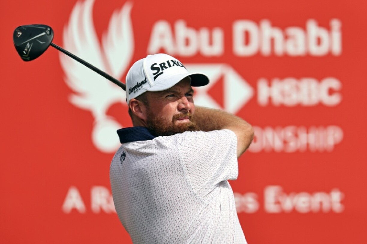 Shane Lowry driving toward a first-round 64 in Abu Dhabi