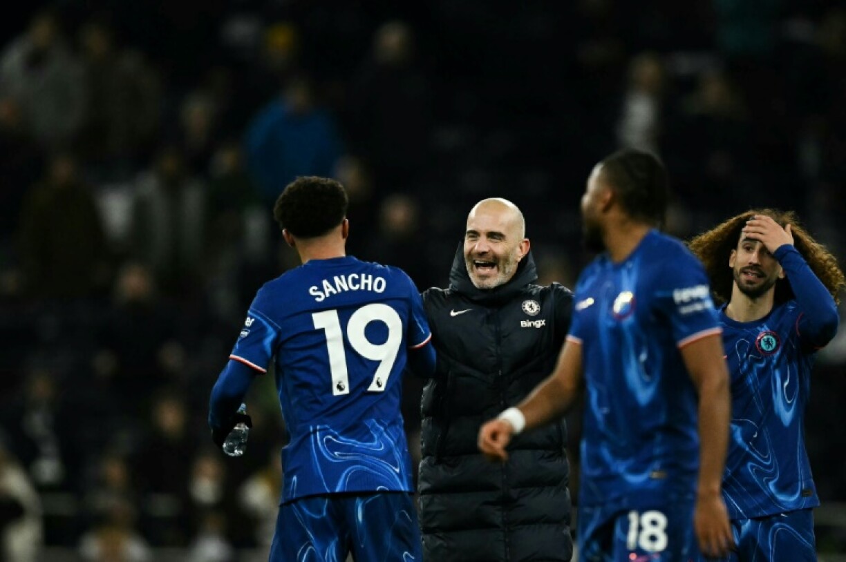 Chelsea manager Enzo Maresca celebrates with his players after their 4-3 win at Tottenham