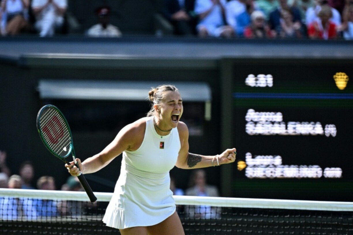 Aryna Sabalenka celebrates after beating Laura Siegemund at Wimbledon