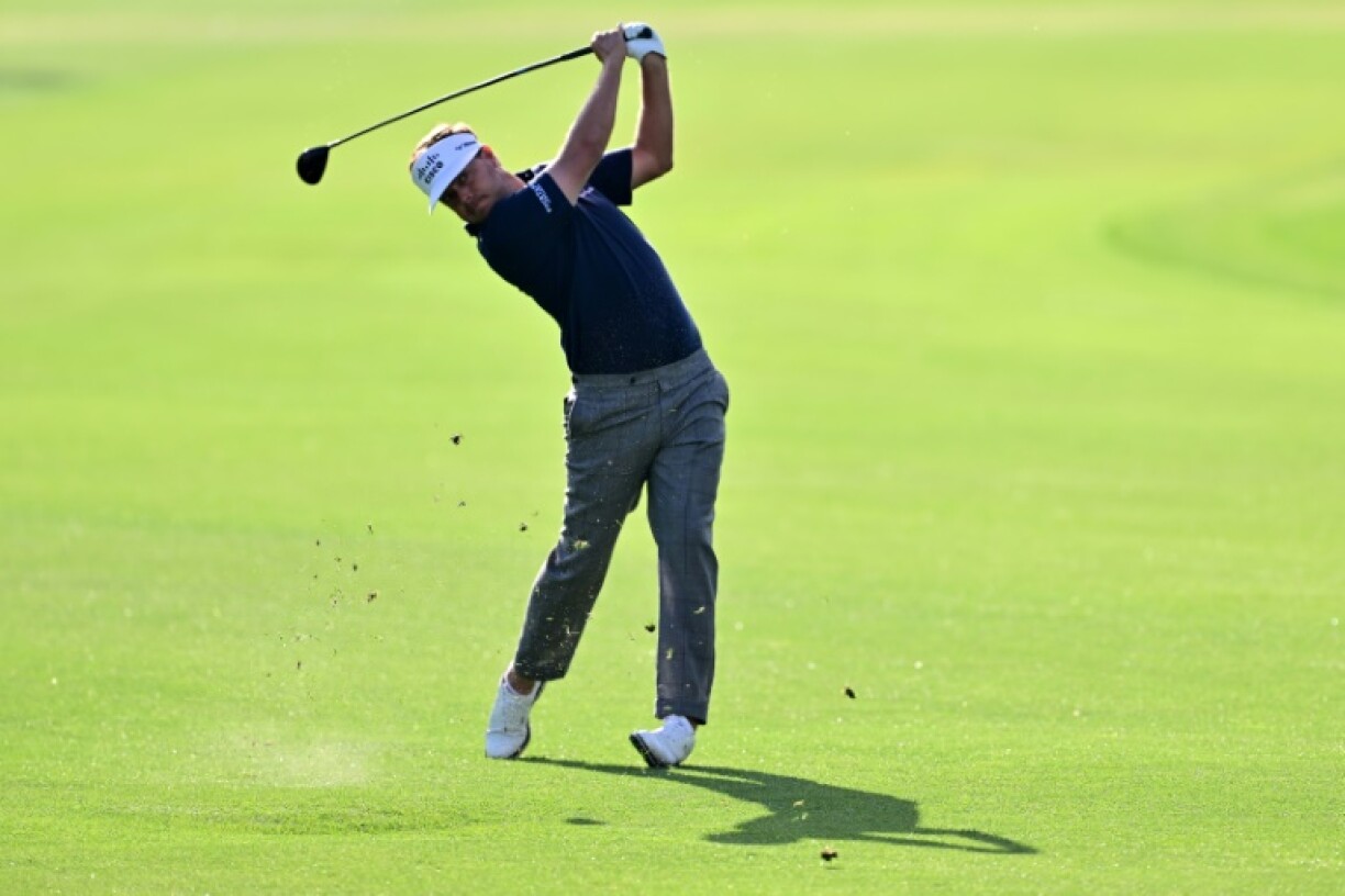 American Keith Mitchell plays a shot on the way to a share of the first-round lead in the US PGA Tour Valspar Championship