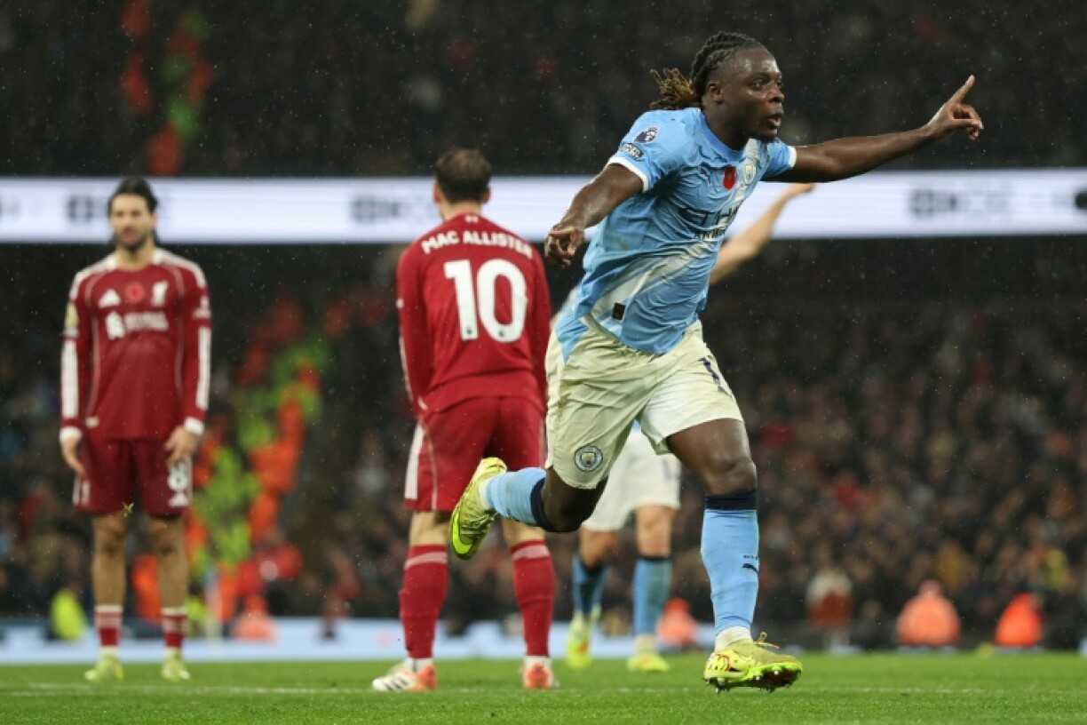 Manchester City's Jeremy Doku celebrates scoring against Liverpool
