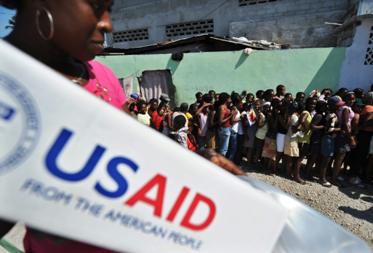 The US Agency for International Development, whose logo is seen here in Haiti after a devastating earthquake in 2010, distributes humanitarian aid around the world