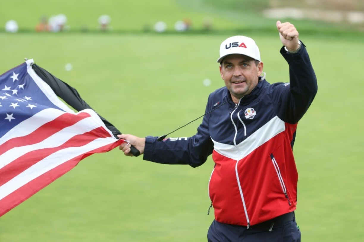 US captain Keegan Bradley brandishes and American flag as the host nation gears up for the start of the Ryder Cup golf showdown with Europe at Bethpage Black
